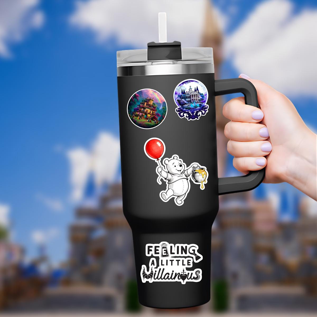 Disneyy  Winnie The Pooh Disney Laptop Sticker Positive Affirmation planner stationery decal water bottle cell.  : A sticker featuring Winnie the Pooh holding a red balloon. The bear is white with a red shirt and black outline. The balloon is a solid red circle. The background is blurred, showing a castle and blue sky with clouds. The sticker is held by a hand.
